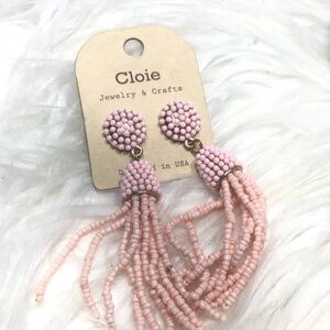 Pink beaded earrings.
